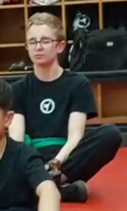 Jonathan's focus is a good indicator of his student success in martial arts