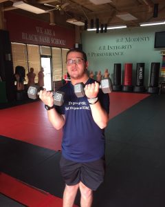 Josh Goblowsky martial arts student during Brain Injury Awareness Month at American Academies of Martial Arts