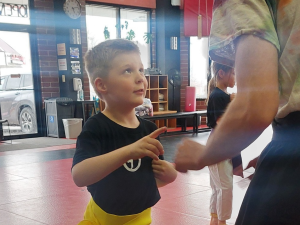 child practicing martial arts for military kids kung fu class bellevue ne