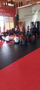 Youth martial arts students learning leadership and perseverance at American Academies of Martial Arts in Bellevue Nebraska
