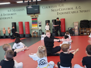 Students and instructors training together at American Academies of Martial Arts in Bellevue, Nebraska